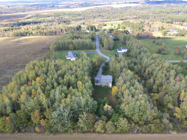 birds eye view of property featuring a rural view