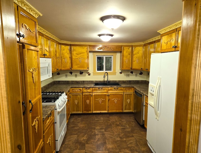 kitchen featuring sink and white appliances