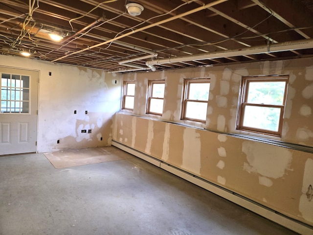 basement with a baseboard heating unit