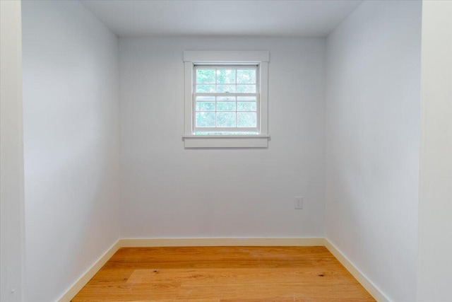 spare room with hardwood / wood-style floors