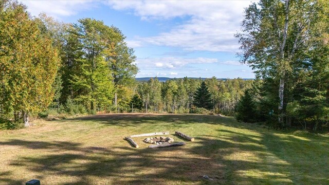 surrounding community featuring a lawn