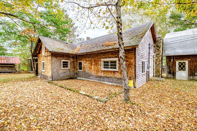 2457 Main St, Hanover, ME 04237 - rear view of property featuring an outdoor structure