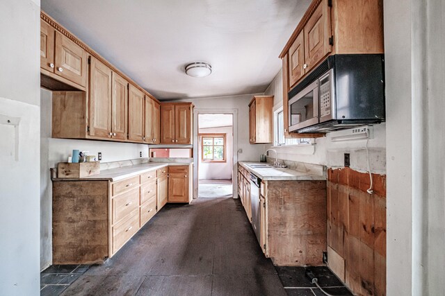 kitchen featuring stainless steel appliances, sink, dark hardwood / wood-style flooring, and lofted ceiling