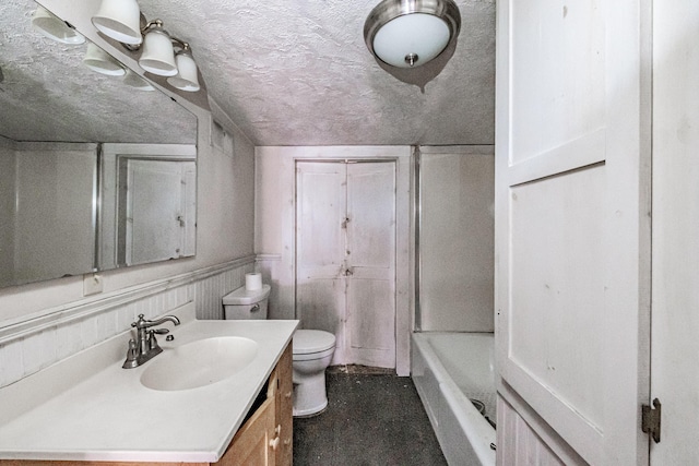 2457 Main St, Hanover, ME 04237 - full bathroom with vanity, a tub, and a textured ceiling