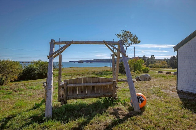 exterior space with a water view