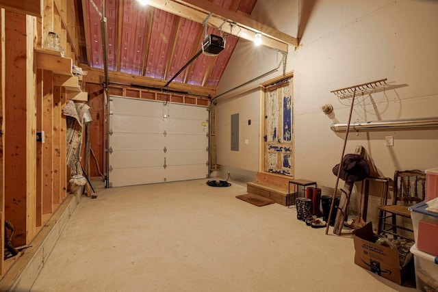 garage with electric panel and a garage door opener