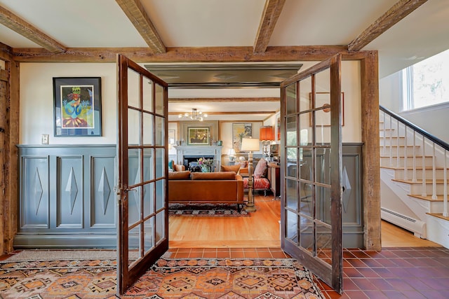 87 Carter Point Rd, Sedgwick, ME 04676 - foyer entrance with a baseboard radiator, french doors, tile patterned floors, beamed ceiling, and stairs