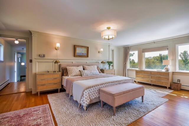 87 Carter Point Rd, Sedgwick, ME 04676 - bedroom with wood finished floors and multiple windows