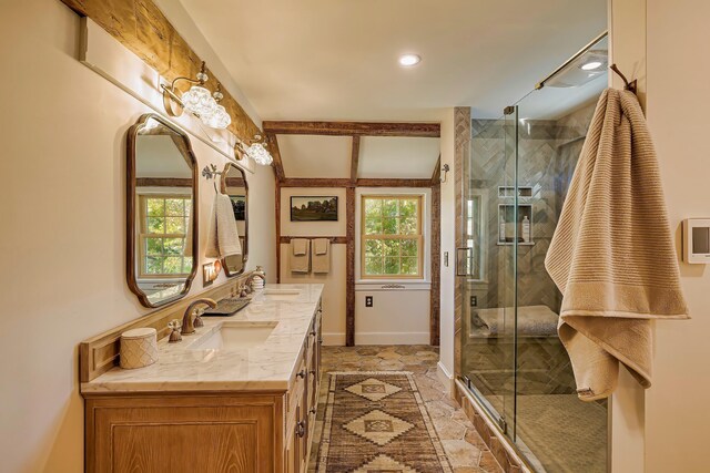 87 Carter Point Rd, Sedgwick, ME 04676 - bathroom featuring healthy amount of natural light, double vanity, a stall shower, stone tile flooring, and recessed lighting