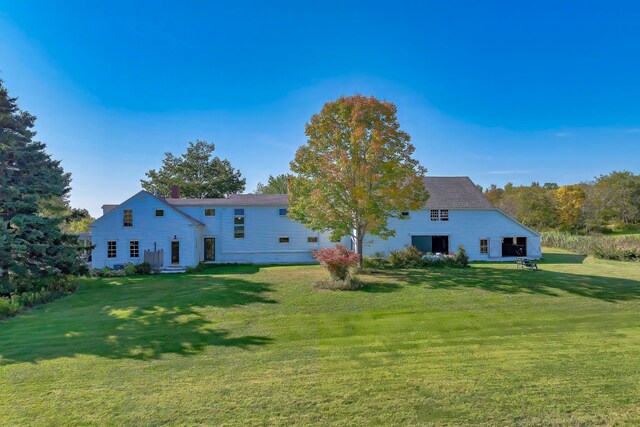 87 Carter Point Rd, Sedgwick, ME 04676 - back of house with a lawn