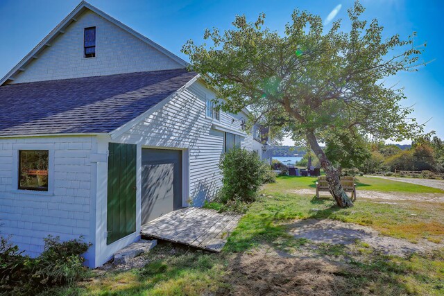 87 Carter Point Rd, Sedgwick, ME 04676 - view of property exterior with roof with shingles