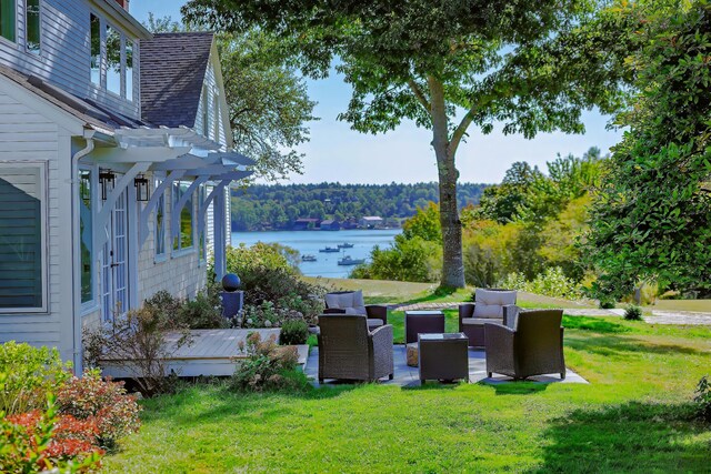 87 Carter Point Rd, Sedgwick, ME 04676 - view of grassy yard with an outdoor hangout area and a deck with water view