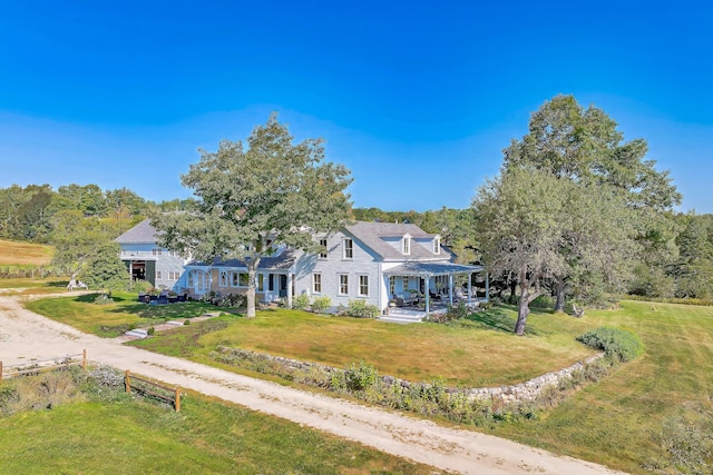 87 Carter Point Rd, Sedgwick, ME 04676 - rear view of property with covered porch and a yard