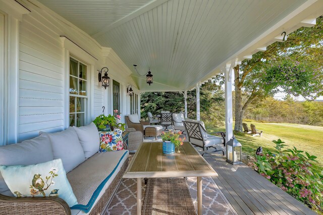 87 Carter Point Rd, Sedgwick, ME 04676 - porch featuring an outdoor living space and a yard