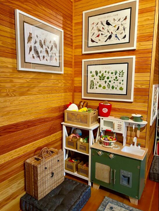 game room featuring wooden walls and hardwood / wood-style floors