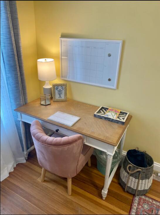 office space with wood-type flooring