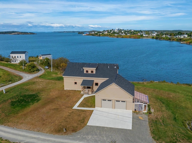 drone / aerial view featuring a water view