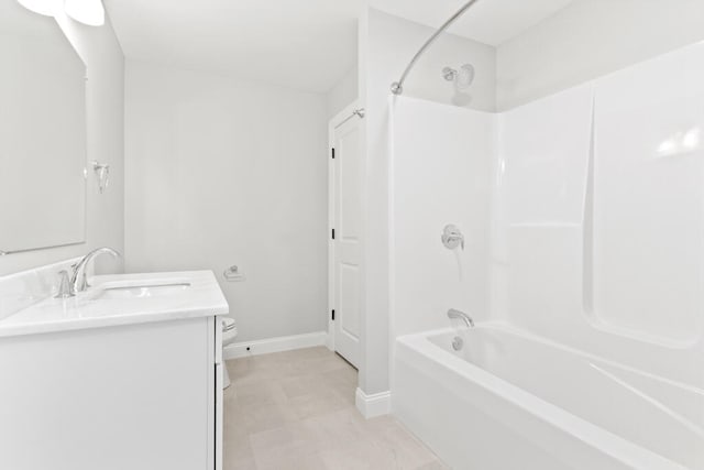 full bathroom with shower / tub combination, vanity, and toilet