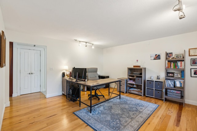 home office featuring light hardwood / wood-style flooring