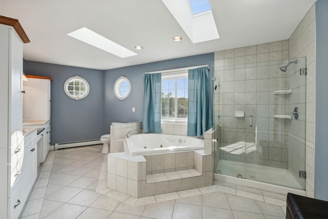 full bathroom featuring vanity, a baseboard heating unit, tile patterned floors, independent shower and bath, and toilet