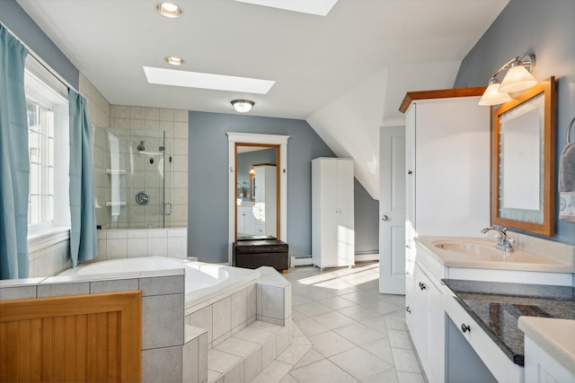 bathroom featuring vanity, a baseboard heating unit, tile patterned floors, lofted ceiling with skylight, and shower with separate bathtub