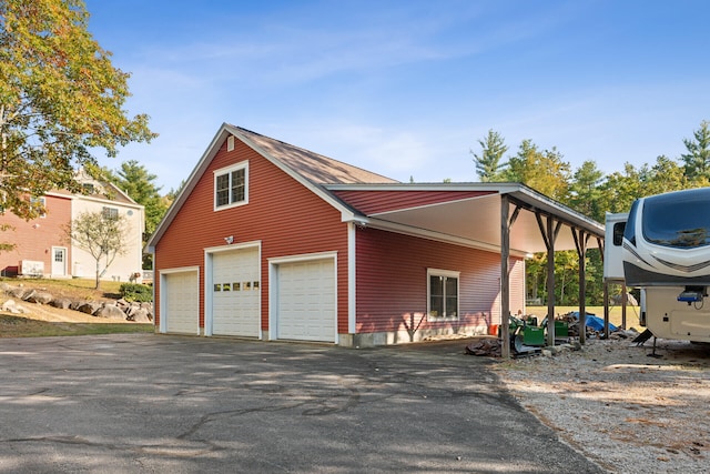 view of home's exterior with a garage