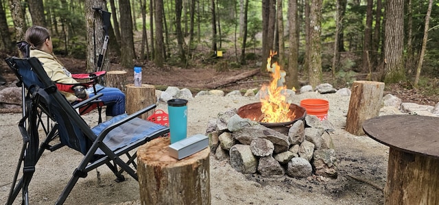 exterior space with a fire pit