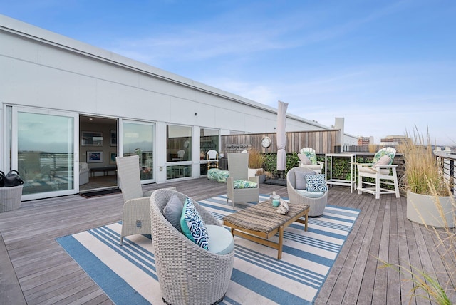 deck with an outdoor hangout area