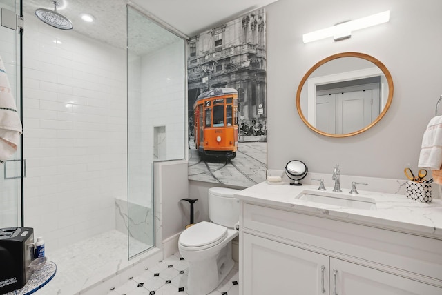 383 Commercial St Unit 701, Portland, ME 04102 - bathroom with vanity, a tile shower, and toilet