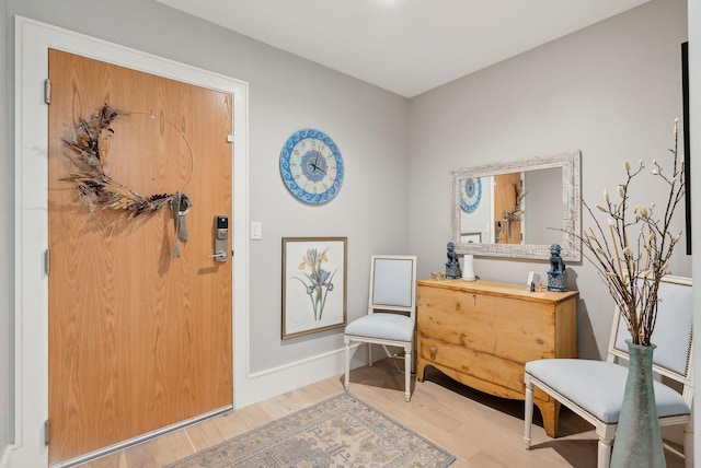 383 Commercial St Unit 701, Portland, ME 04102 - living area featuring light wood-style floors and baseboards