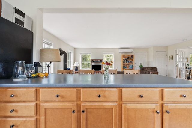 kitchen featuring a wall unit AC