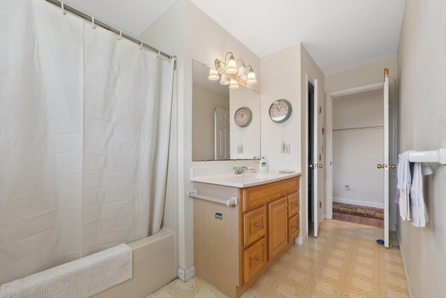 bathroom with shower / bath combination with curtain and vanity