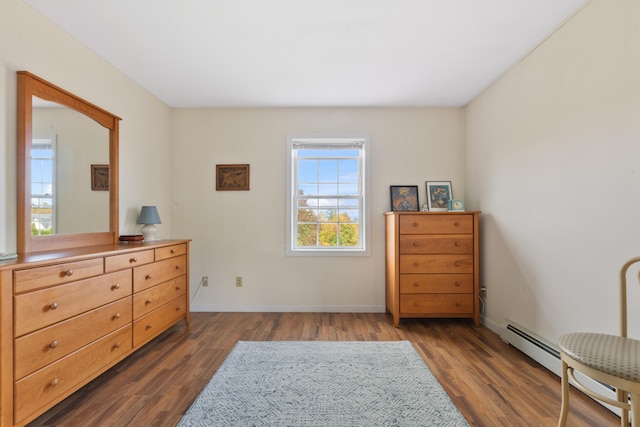 living area with dark hardwood / wood-style floors