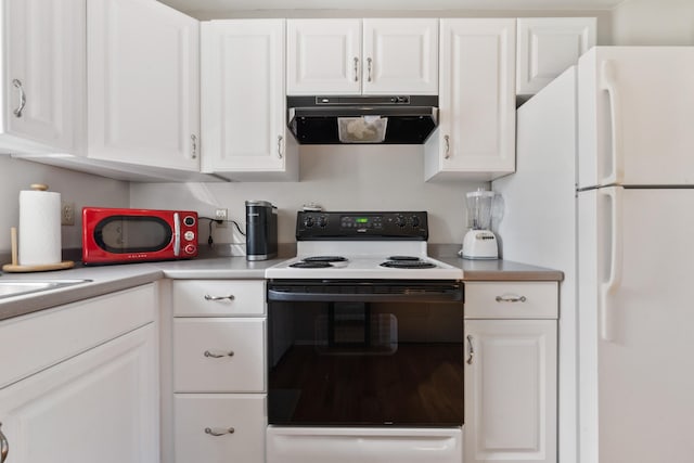 kitchen with white cabinets and white appliances