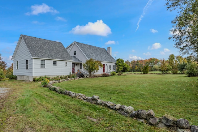 exterior space with a front lawn