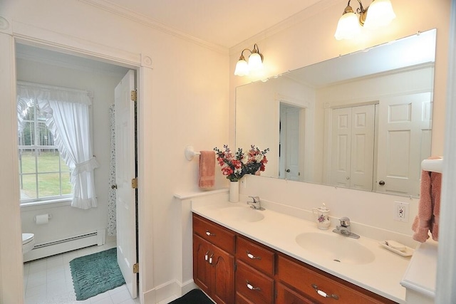 bathroom with vanity, toilet, crown molding, and baseboard heating