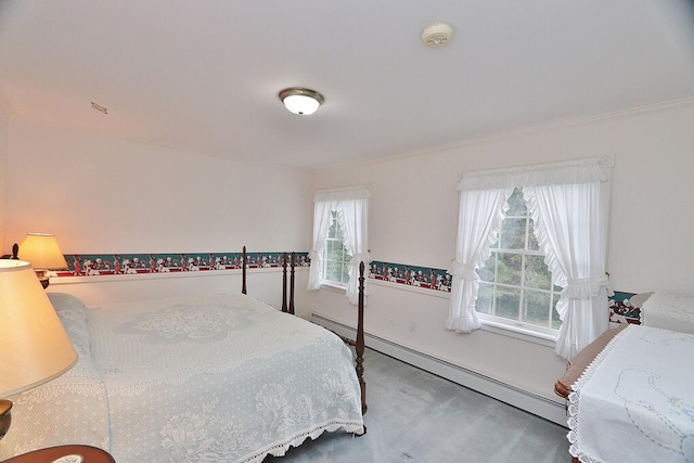 carpeted bedroom with crown molding and baseboard heating