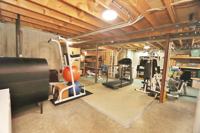 workout area featuring concrete floors