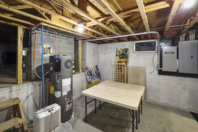 basement with heat pump water heater and electric panel