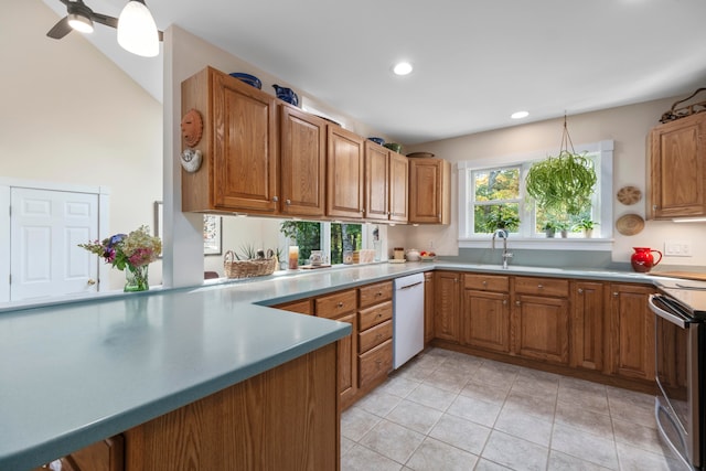 kitchen with ceiling fan, light tile patterned flooring, hanging light fixtures, dishwasher, and electric stove