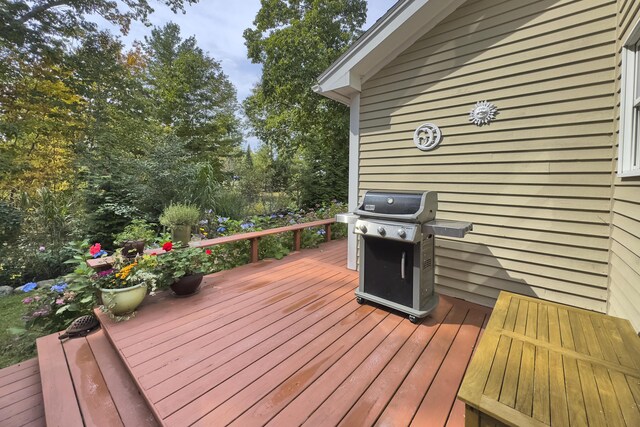 wooden deck with grilling area