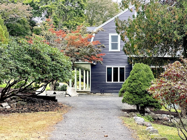 exterior space featuring aphalt driveway