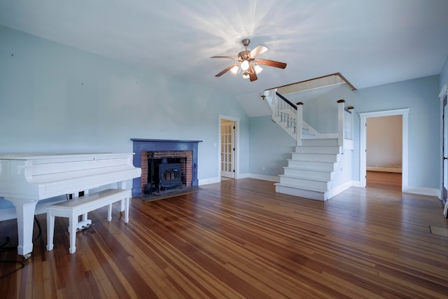 unfurnished living room with a baseboard radiator, lofted ceiling, ceiling fan, and dark hardwood / wood-style flooring