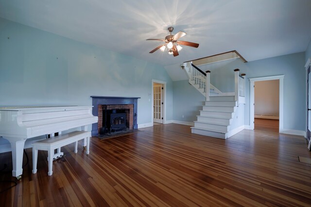 unfurnished living room with vaulted ceiling, dark hardwood / wood-style flooring, ceiling fan, and a baseboard radiator