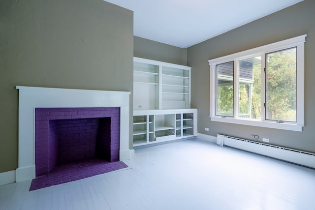 unfurnished living room featuring a baseboard radiator and light wood-type flooring