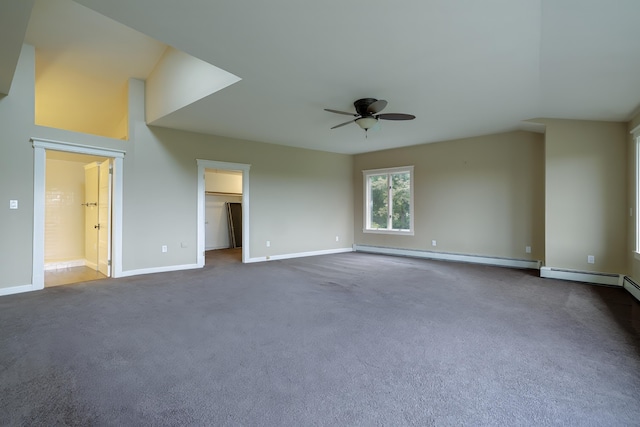 interior space with baseboard heating, dark carpet, baseboards, and a ceiling fan