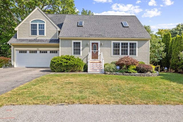 cape cod-style house with a front yard and a garage