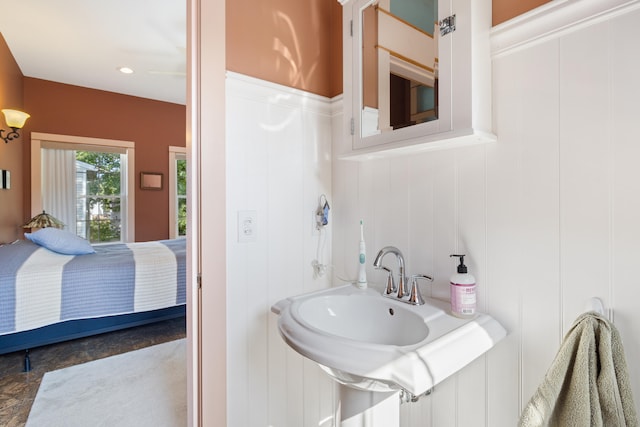 ensuite bathroom with a sink and ensuite bath