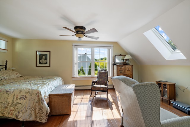 bedroom featuring a ceiling fan, light wood-type flooring, a baseboard heating unit, and lofted ceiling