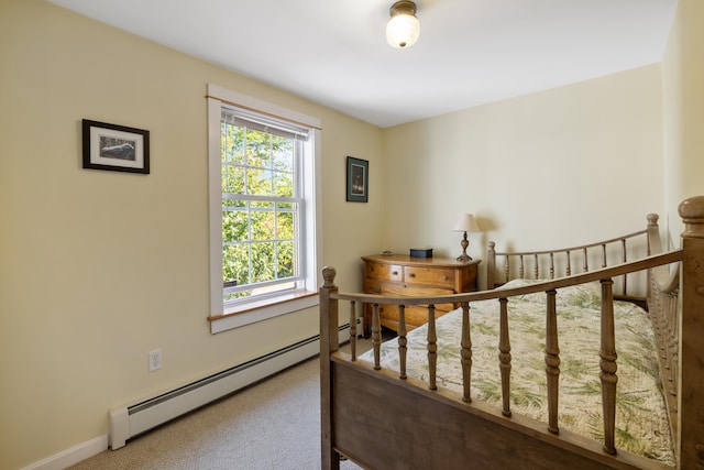 carpeted bedroom featuring baseboards and baseboard heating